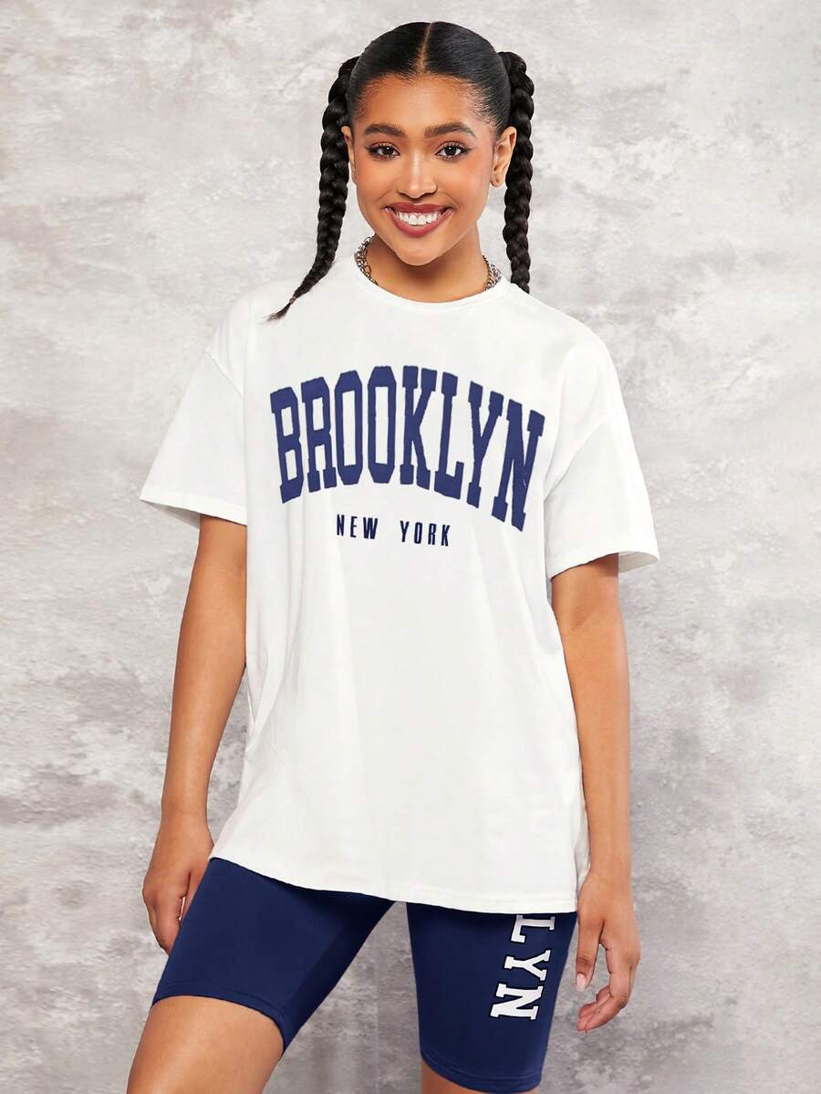 SHEIN Set de 2 piezas con camiseta de manga caída con estampado y shorts de color contrastante para adolescentes - Azul Marino - Ver 1