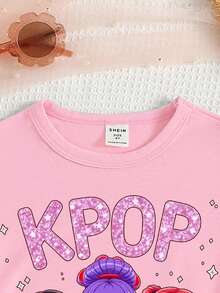 Camiseta corta básica casual para niñas jóvenes en primavera y verano, con estampado gráfico de personaje de grupo musical virtual, lema y diseño simple y fresco. Prenda cómoda y versátil para uso diario en primavera, verano y otoño. - Rosa - Ver 5