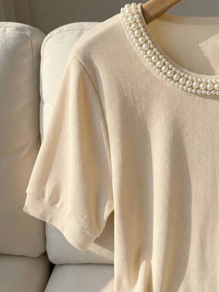 Franclia Camiseta de mujer de cuello redondo de manga corta color albaricoque sólido con adornos de perlas falsas, ajustada, de tela de punto suave y cómoda. Hermosa, exquisita y elegante, adecuada para el uso diario, top de estilo francés, desde la primavera hasta las vacaciones de verano - Albaricoque - Añade 6