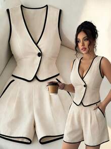 Selianne Bộ trang phục thanh lịch dành cho nữ, gồm áo blazer không tay dáng ôm màu kaki và đen giả vải lanh, kết hợp cùng quần short dáng ôm màu kaki có túi, thích hợp cho kỳ nghỉ. - Màu Khaki - Xem 1