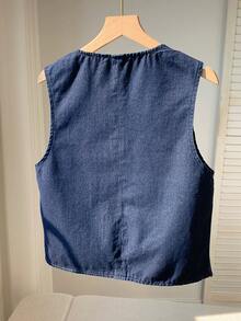 Comfortcana Áo khoác denim nữ thêu hoa, thắt nơ phía trước, thích hợp cho kỳ nghỉ hè, trang phục mùa xuân, áo nữ dự lễ Phục sinh, trang phục ngày Thánh Patrick, trang phục đi biển cho nữ, áo nữ đi chơi, trang phục đi nghỉ mát, áo kiểu nữ thường ngày, áo nữ màu xanh dương, áo khoác denim thêu không tay cổ chữ V thắt nơ phía trước, viền ren. - Rửa tối - Xem 2