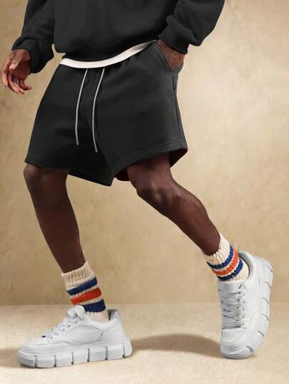  Pantalones cortos de sudadera con caída de entrepierna esencial SUMWON con cordón en la cintura y dobladillo enrollado para uso casual y urbano, lisos