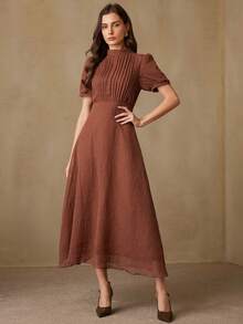 Revavyn Elegante vestido de manga larga para mujeres con cuello redondo, frente plisado, cintura ceñida y bajo acampanado, con sensación de lino, ideal para ir al trabajo y de vacaciones - Óxido marrón - Ver 1