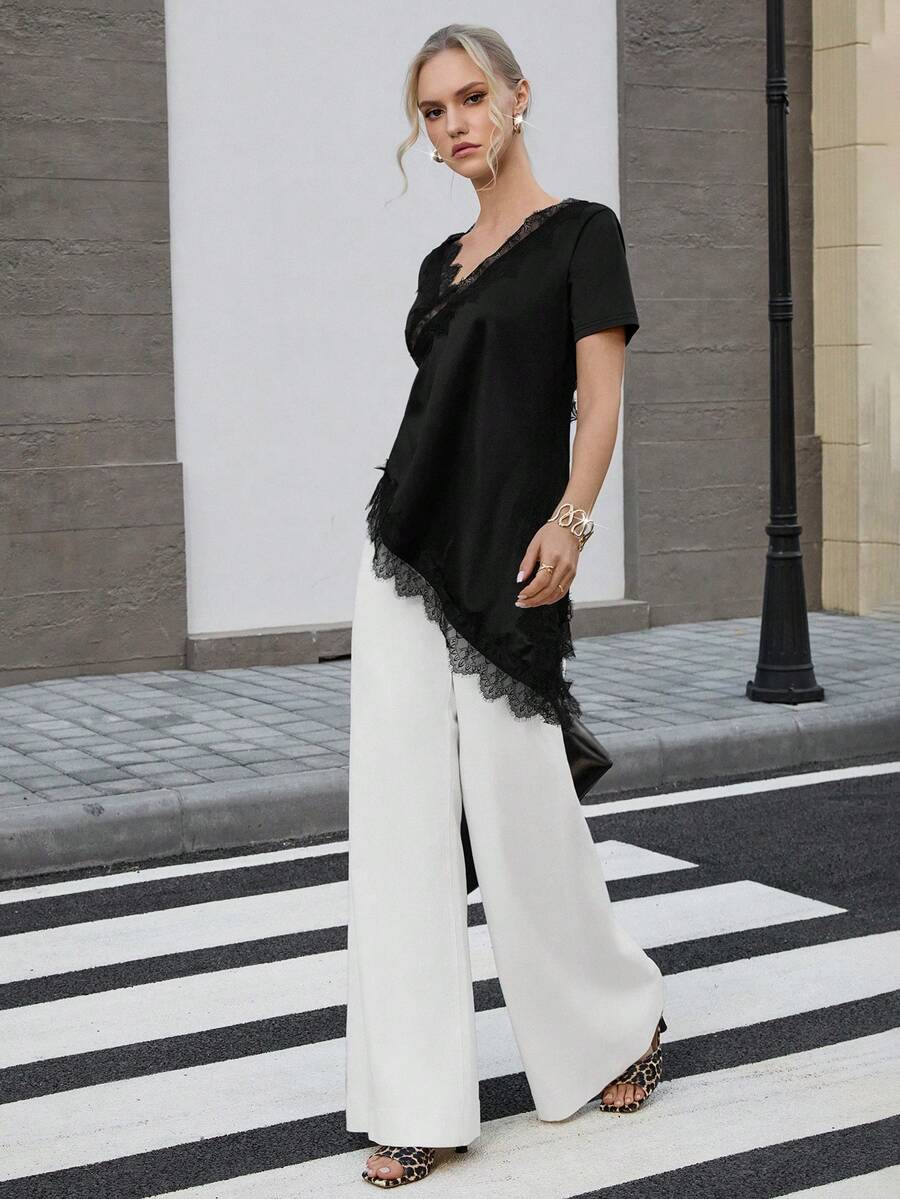 Opuloom 女士时尚优雅荷叶边领蕾丝边吊带背心，适合情人节、婚礼、节日、休闲外出、派对等场合，采用不对称下摆和弹力面料。 - 黑色 - 查看 1