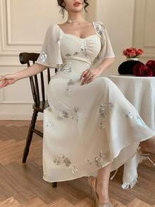 DAZY Vestido de verano de mujer con cuello cuadrado, mangas con volantes y decoración de lentejuelas florales elegantes - Albaricoque - Ver 1