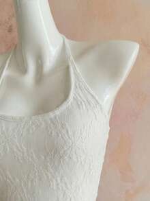 Selianne Áo tank top nữ thanh lịch, thời trang, thoải mái, quyến rũ, cổ điển tối giản, cao cấp, lãng mạn, thích hợp cho kỳ nghỉ, không tay, cổ yếm, thắt nơ ở eo, ôm sát, viền ren jacquard, phối tua rua, màu trơn. - trắng - Xem 4