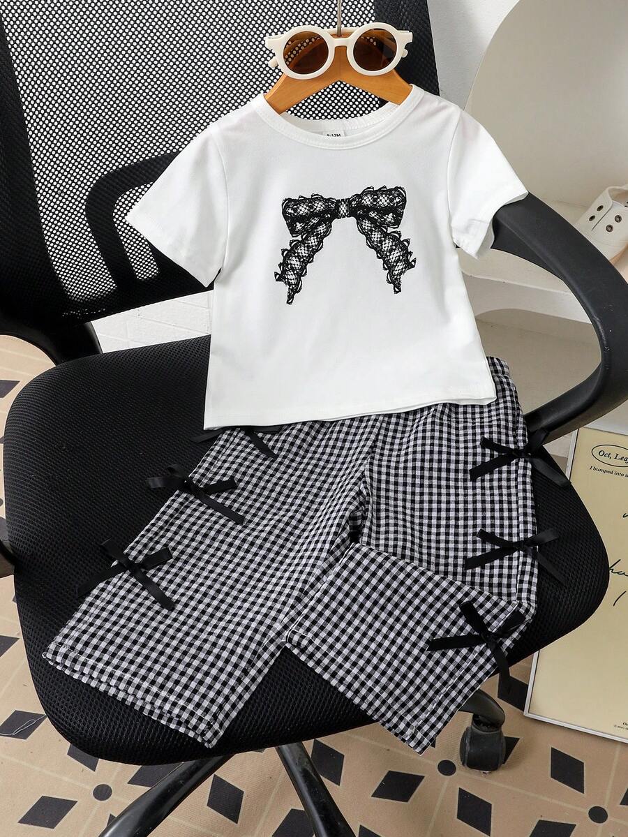 SHEIN 两件套女童夏季时尚简约街头风白色短袖T恤(黑色刺绣装饰)搭配杏色条纹裤,适合日常上学穿着 - 黑與白 - 查看 1