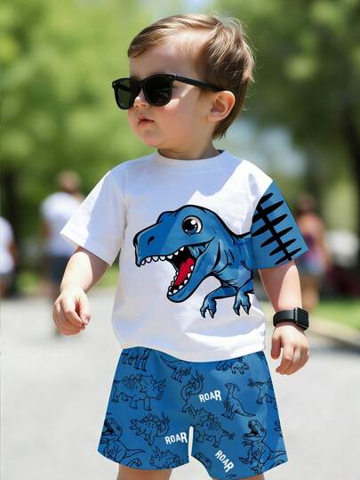 1 Set Niños Pequeños Lindo Diseño de Parche con Estampado de Dinosaurio Azul Cuello Redondo Camiseta de Manga Corta y Pantalones Cortos a Juego con Estampado de Dinosaurio y Letras, Conjunto de Verano