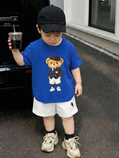 SHEIN Set de 2 piezas de camiseta de manga corta con estampado de oso lindo y pantalones/shorts blancos casuales para bebé niño/niña, conjunto de ropa de primavera/verano para bebé