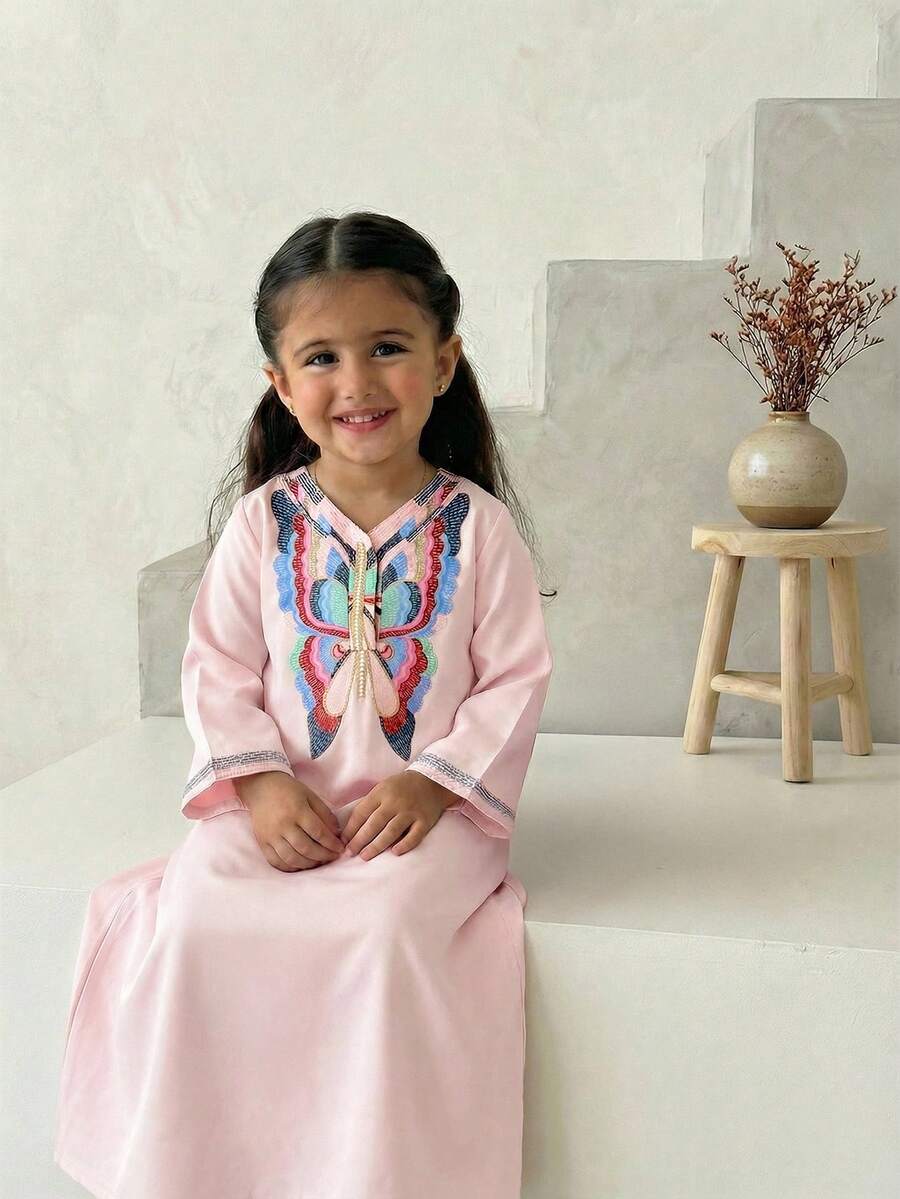 Áo choàng dài rộng rãi, thoải mái, có tua rua chỉ vàng dành cho bé gái. - Nhiều màu - Xem 1