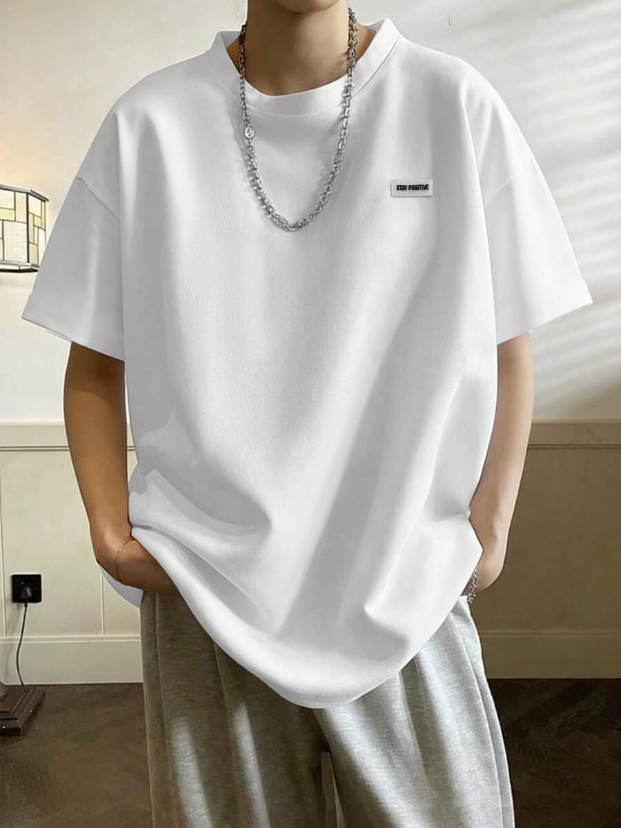 Claim Dot Áo tank top nam cỡ lớn, màu trơn, cổ tròn, vai rớt, tay ngắn, dáng rộng, phong cách thường ngày. - trắng - Xem 1