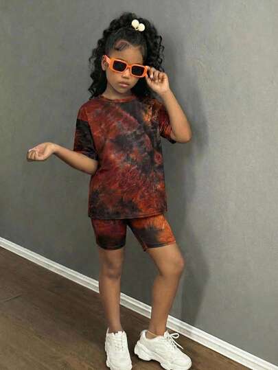 Conjunto de camiseta de cuello redondo holgada con efecto tie-dye y leggings negros para niñas preadolescentes