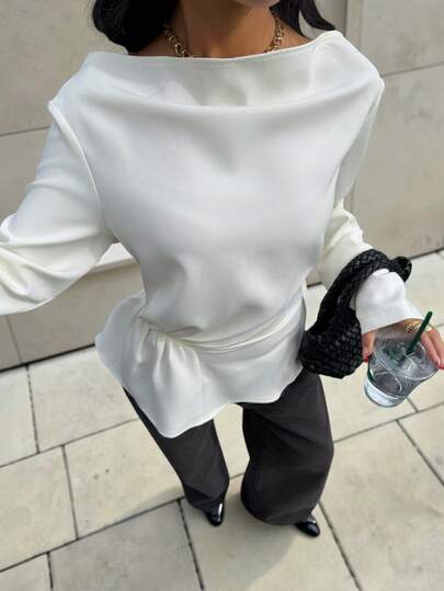 Siren Gaze This Minimalist, Sophisticated White Fitted Blouse For Women Features A Wide Collar That Reveals The Collarbone, A Cinched Waist For A Flattering Silhouette, And A Ruffled Hem That Flatters The Figure. The Long Sleeves Add A Touch Of Elegance, And The Soft, Comfortable Fabric Makes It A Versatile And Stylish Choice For Various Occasions, From Work And Dates To Casual Everyday Wear. White Blouse Spring Elegant