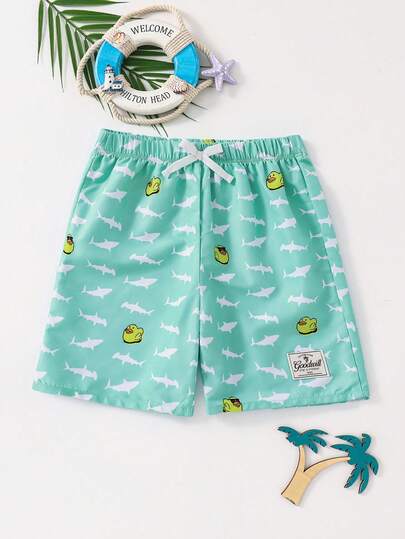 SHEIN Tween Boys' Fashionable Loose Print Beach Shorts, Suitable For Summer, Beach, Outdoor Activities, Swimming Suitable For Beach Vacations And Swimming; Suitable For Summer And Spring.