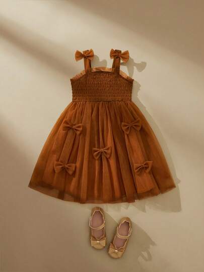 SHEIN Girls' Spaghetti Strap Dress With Cute 3D Bow Decor, Mesh Tulle Coffee Color Princess Dress, Adorable Sweet Elegant Summer Party Dress For Children