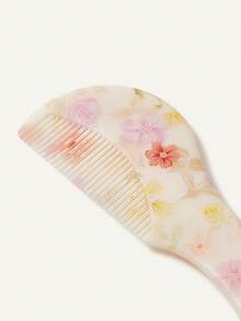 Cozy Pixies 两件套婴儿护理工具，包括梳子和花朵造型发刷，可轻柔梳理头发，也可用于婴儿洗澡。 - 彩色 - 查看 7