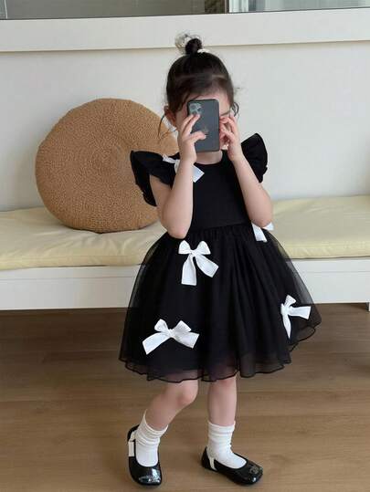 SHEIN Baby Girl Elegant Sweet Casual Black & White Dress For Spring/Summer, Combining Classic Black & White With Adorable Details Like 3D Bow & Ruffle Sleeves
