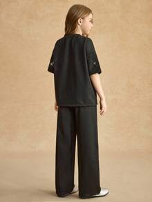 Conjunto de camiseta para niñas preadolescentes, incluye camiseta holgada de manga corta negra con decoración de letras de lentejuelas y pantalones anchos holgados negros, tela suave y agradable para la piel, adecuado para uso diario y ocio de vacaciones, nueva colección de verano - Negro - Ver 5