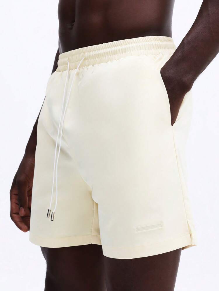 ドローストリングウエスト付き水泳パンツ