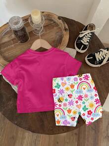 SHEIN Bộ áo thun ngắn tay cổ tròn và quần legging cho bé gái, kiểu dáng thường ngày dễ thương, in hình hoa, mặt cười, cầu vồng, côn trùng, bướm, thích hợp cho mùa xuân/hè. Quần áo bé gái, bộ đồ bé gái, bộ đồ bé gái, bộ đồ cầu vồng cho bé gái, bộ đồ mùa hè cho bé gái, bộ đồ thường ngày cho bé gái, bộ đồ ngắn tay cho bé gái. - Nhiều màu - Xem 2