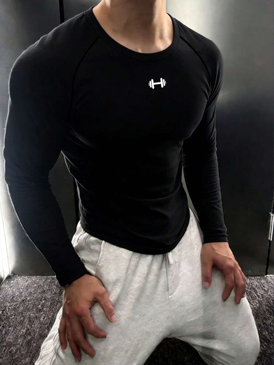 GymBeat Camiseta Esportiva Manga Longa Raglan com Impressão de Barra Olímpica para Homens - Preto - Visão 1
