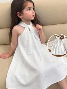 SHEIN Đầm chữ A cổ yếm màu trắng sữa cho bé gái, điểm nhấn là chiếc nơ lớn đính ngọc trai, kiểu đầm công chúa dễ thương thích hợp cho tiệc tùng, chụp ảnh, đi chơi hoặc mặc hàng ngày. - trắng - Xem 1