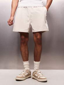 PLAYBOY X SUMWON Men's Drawstring Pull On Elastic Waist Casual Summer Nylon Shorts With Side Pockets - Apricot - View 4