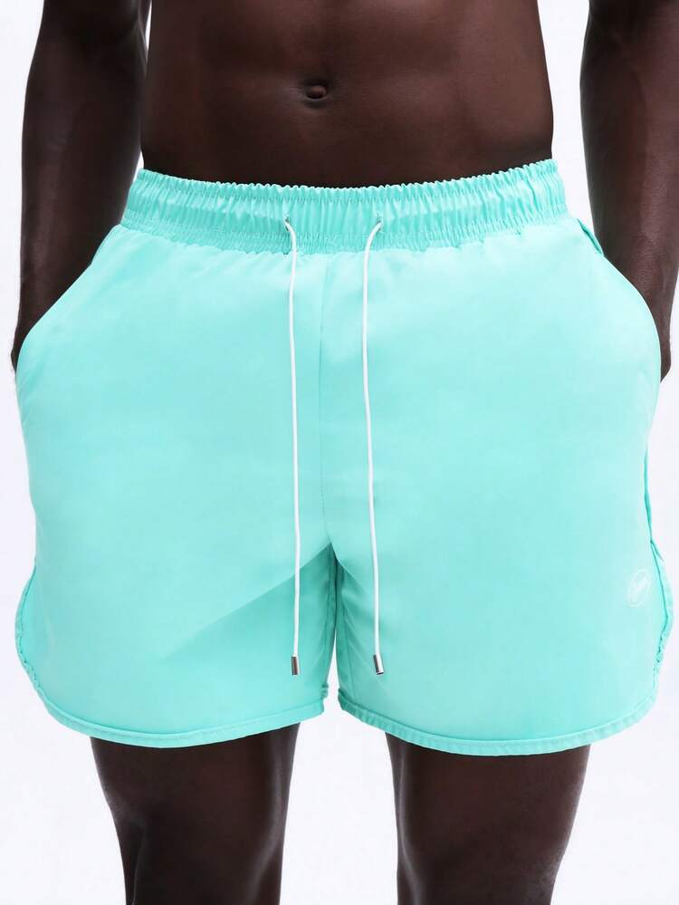 Curve Hem Swim Shorts With Drawstring
