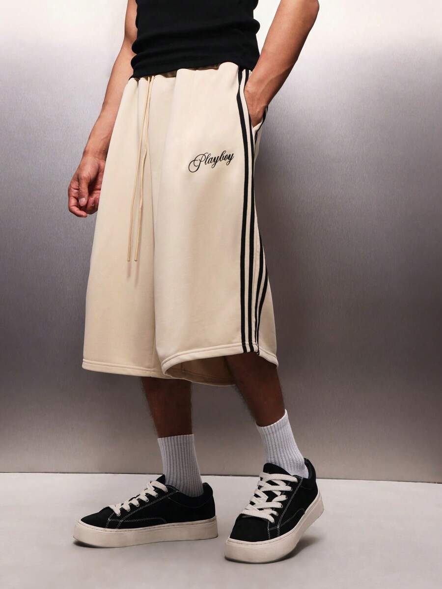 PLAYBOY X SUMWON Men's Bunny Logo Jersey Jorts Knee Length Wide Leg Basketball Shorts With Side Stripes Casual Summer Streetwear - Apricot - View 1