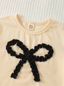 Cozy Pixies Conjunto de 2 piezas de camiseta de manga corta de cuello redondo suave de punto con lazo y pantalones de cintura elástica para niña bebé - Negro - Ver 4