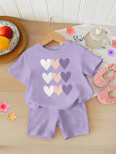 SHEIN Baby Girl Casual Heart Pattern Round Neck Short Sleeve T-Shirt And Leggings Set, Suitable For Spring/Summer Spring/Summer Casual Wear Perfect For Outings, Street Style & Hip-Hop Vibes Effortlessly Comfortable Fashionable Girls' Casual Wear New Arrivals Back-To-School Season Unique Perspective Modern Fashion Back-To-School Season