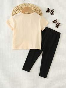 Cozy Pixies Conjunto de 2 piezas de camiseta de manga corta de cuello redondo suave de punto con lazo y pantalones de cintura elástica para niña bebé - Negro - Ver 2