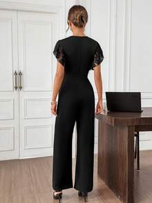 SHEIN Clasi Women's Elegant Black V-Neck Lace Collar Splice Lace Ruffle Sleeve Split Waist Long Knitted Elastic Jumpsuit, Summer Commute Jumpsuit, Travel Jumpsuit, Daily Jumpsuit Black Rompers For Women Black Romper Jumpsuit Black Jumpsuit Women Elegant Wedding Guest Jumpsuit Women Womens Jumpsuit - Black - View 2