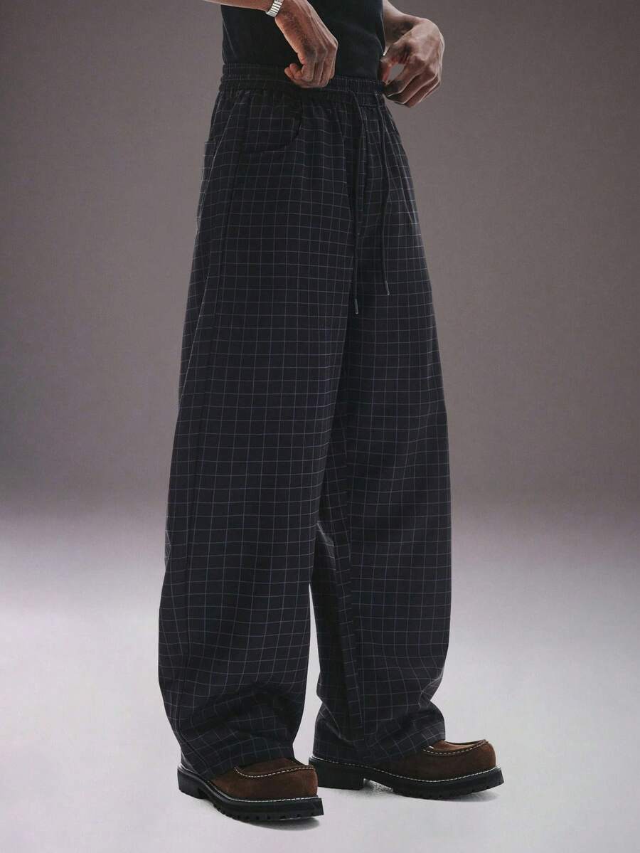 STYNVO Quần ống đứng dáng rộng, cạp chun, túi xéo, họa tiết kẻ caro, quần nam. - màu đen - Xem 1