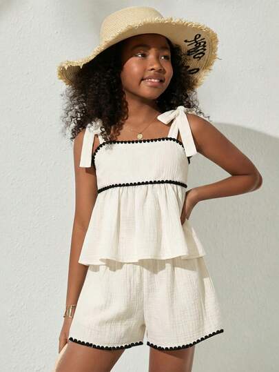 SHEIN Sparklyn 2-Piece Girls' Summer Casual Fashion Set Classic Comfortable Ensemble White 100% Cotton Tie-Front Off-Shoulder Top With Black Lace Embroidered Ruffles Paired With White Shorts Ideal For Everyday Wear, Shopping, Beach Outings, Vacations, And More