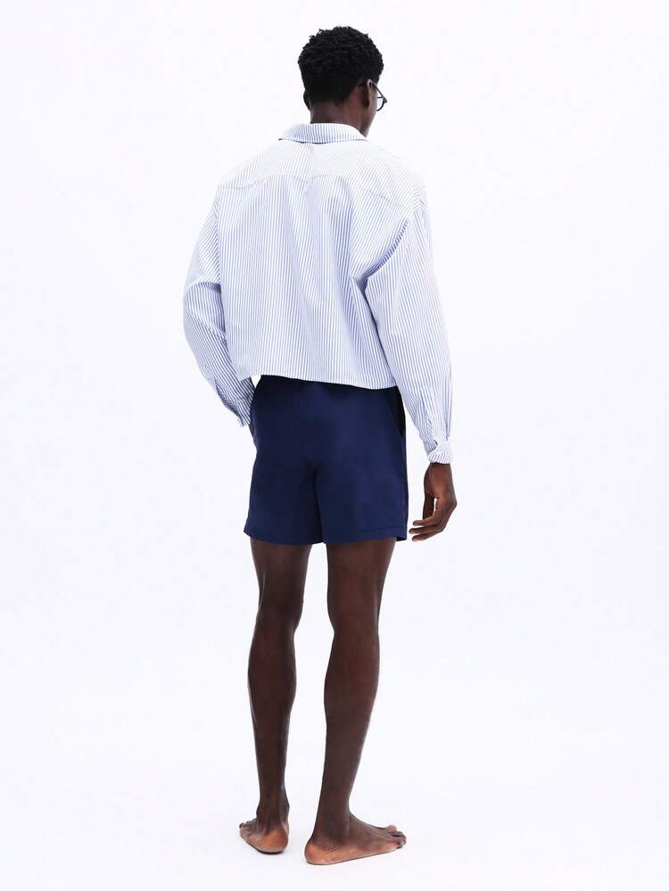 Conjunto de playa a rayas con pantalones cortos con cordón