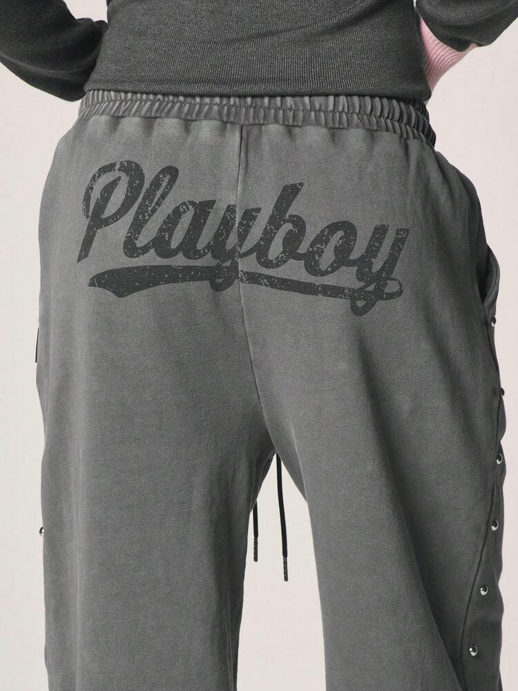 Missguided x Playboy Gewaschene Jogginghose mit Bündchen, Nieten und Häschen-Logo-Detail