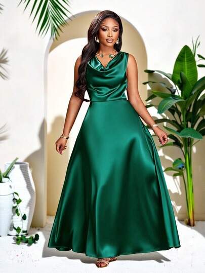 Brilight 这款优雅的女士派对连衣裙，适合生日派对、毕业季、下午茶、感恩节和婚礼季等重要场合。其特点包括垂褶领口、无袖设计、高腰、A字廓形和超长裙摆。采用缎面/丝绸般面料制成，是夏季的理想之选。