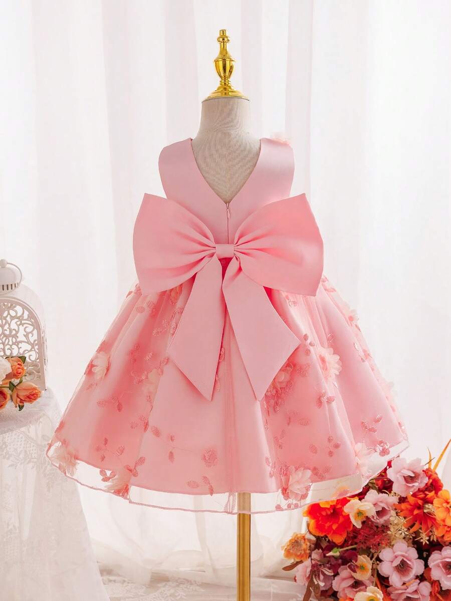 SHEIN Glamorique Kids Đầm dự tiệc thanh lịch màu trắng thêu họa tiết, lưng chữ V, thắt nơ, dành cho bé gái, phù hợp cho mọi mùa. - Hồng - Xem 1