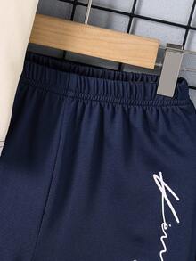 SHEIN Set de 2 piezas: Camiseta de manga corta de cuello redondo + Pantalones cortos, estilo callejero para niños pequeños, para verano, escapadas, vacaciones, viajes, relajación, tomar el sol - Azul - Ver 7