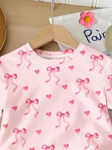 SHEIN 奶油粉色，可爱甜美蝴蝶结印花，女童两件套休闲家居服套装 - 短袖T恤和短裤，适合春夏穿着，营造轻松休闲的氛围，女童套装，舒适易穿，休闲时尚，少女风 - 彩色 - 查看 4