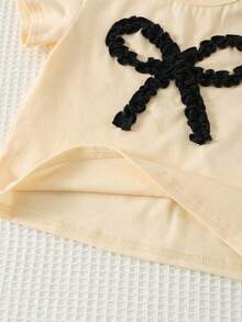 Cozy Pixies Conjunto de 2 piezas de camiseta de manga corta de cuello redondo suave de punto con lazo y pantalones de cintura elástica para niña bebé - Negro - Ver 5