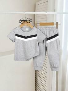 Bộ quần áo thường ngày cho bé trai: áo thun cổ tròn tay ngắn và quần dài. - Màu Xám nhạt - Xem 7