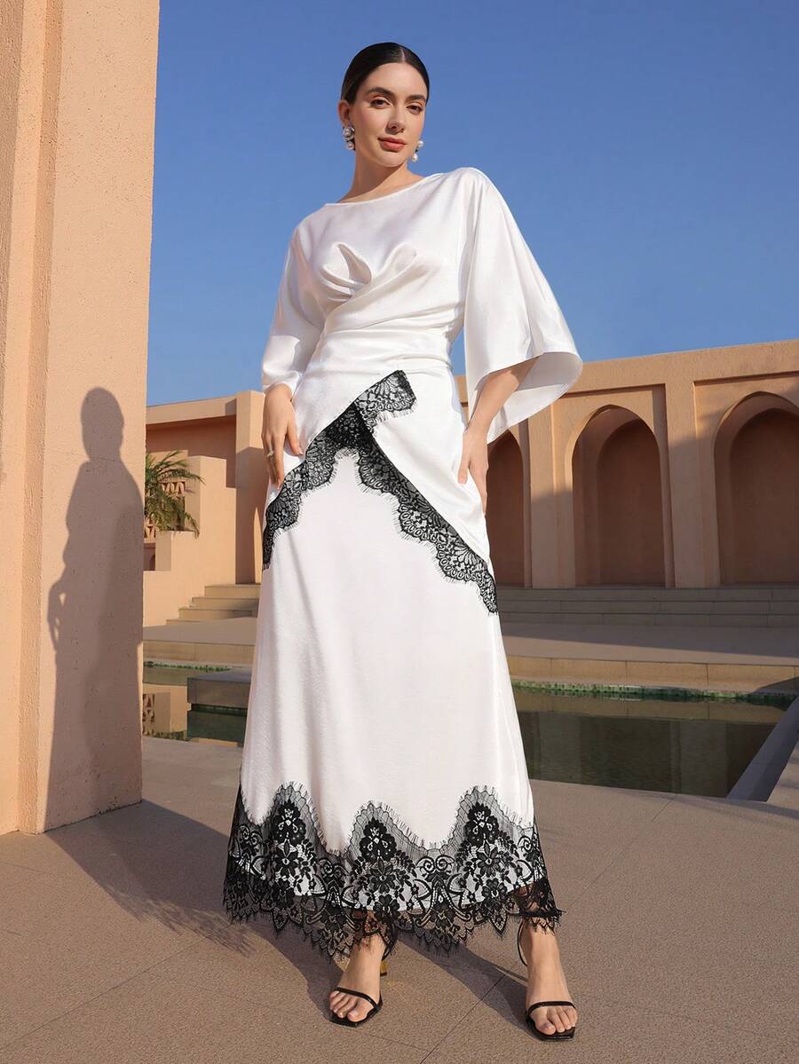 Graceveil 女士优雅撞色蕾丝喇叭袖荷叶边腰部不对称下摆上衣和半裙套装，适合春秋季约会穿着 - 黑與白 - 查看 1