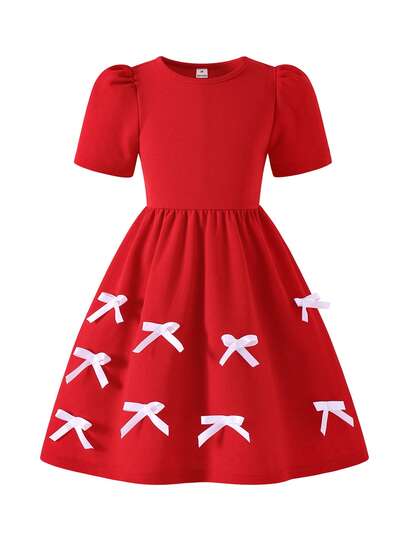 女童红色蝴蝶结装饰短袖连衣裙，收腰设计，舒适柔软，适合秋冬季穿着。