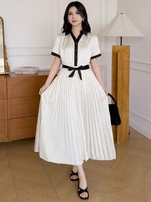 优雅通勤少女连衣裙，黑色衬衫领短袖褶裥喇叭裙，撞色设计，光泽面料，优雅公主裙 - 杏色 - 查看 4