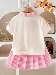 Elladie kids Set de 2 piezas de blusa de manga corta y falda a cuadros para niñas pequeñas, blusa color albaricoque con estampado de cereza y letras, combinada con mini falda a cuadros, conjunto casual de verano dulce y de moda - Rosa Fucsia - Ver 2