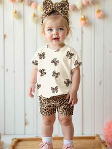 SHEIN Bộ đồ 2 mảnh cho bé gái kiểu dáng tối giản, in họa tiết da báo và nơ, gồm áo thun cổ tròn tay ngắn dáng rộng và quần short, thích hợp mặc hàng ngày, dạo phố, đi chơi, ở nhà hoặc đi nghỉ mát vào mùa xuân/hè. - Nhiều màu - Xem 4