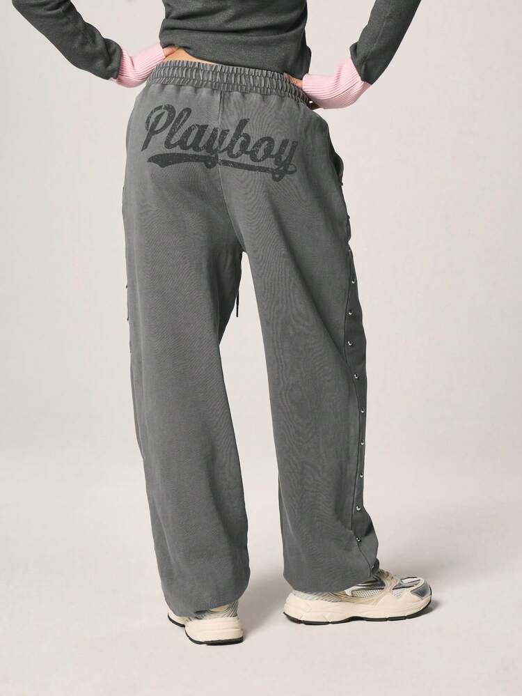 Missguided x Playboy Gewaschene Jogginghose mit Bündchen, Nieten und Häschen-Logo-Detail