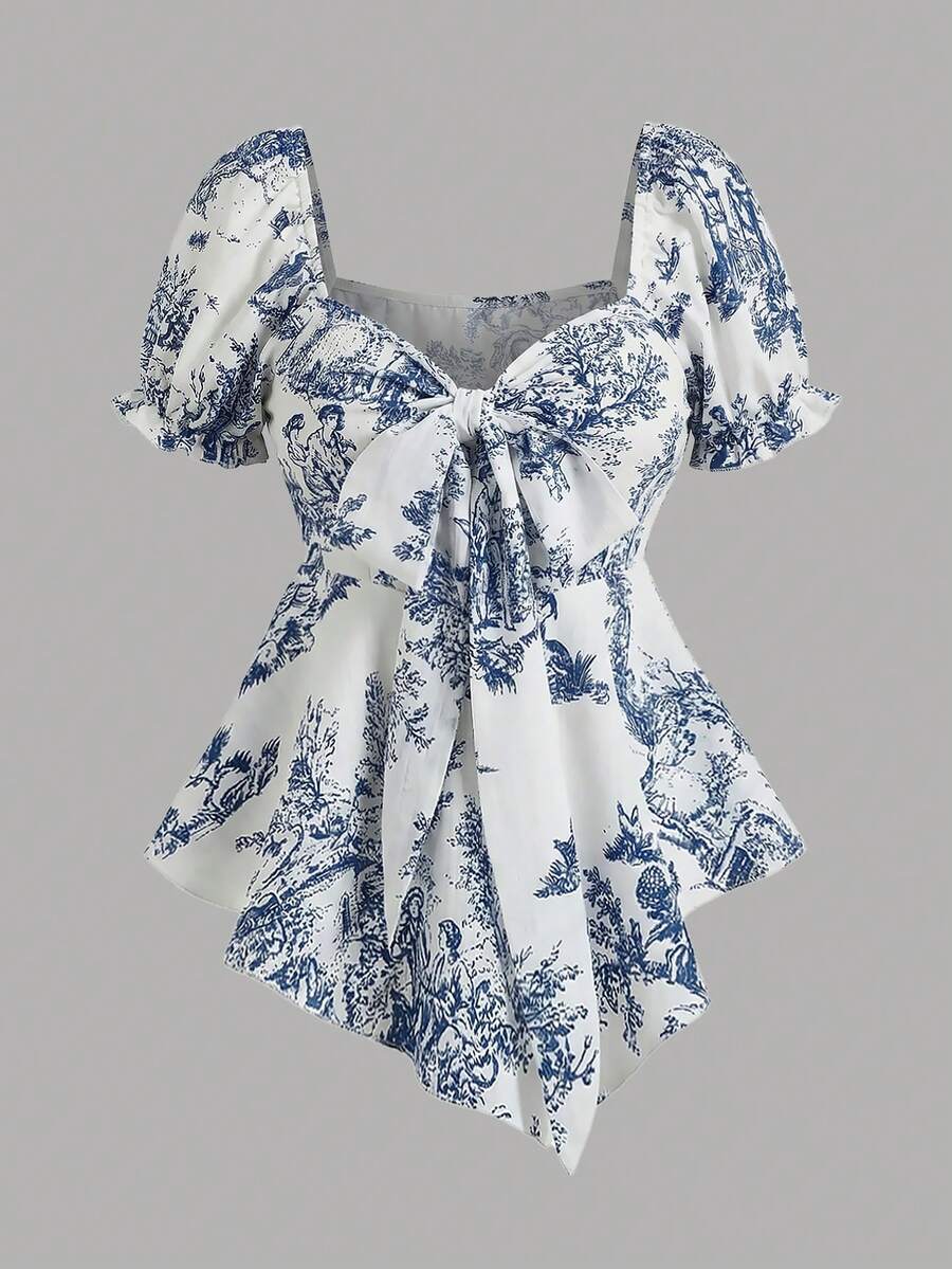 Elenzga 女士蓝色花卉印花纹理面料衬衫，蝴蝶结领，荷叶边后背设计，不对称下摆，优雅休闲度假风，适合教师、学生、度假、旅行、摄影、春夏穿着。 - 彩色 - 查看 1